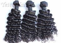 Extensiones malasias reales suaves del pelo del negro azabache profundamente rizadas para las señoras